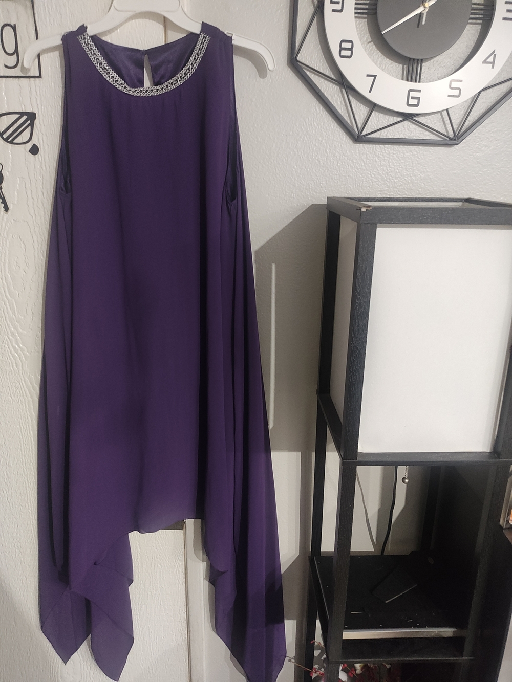 Elegant Purple Sleeveless Evening Dress with Embellished Neckline